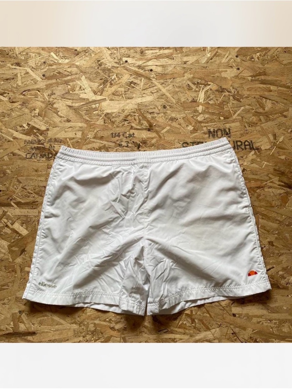 Ellesse White Swim Shorts with Small Orange Logo